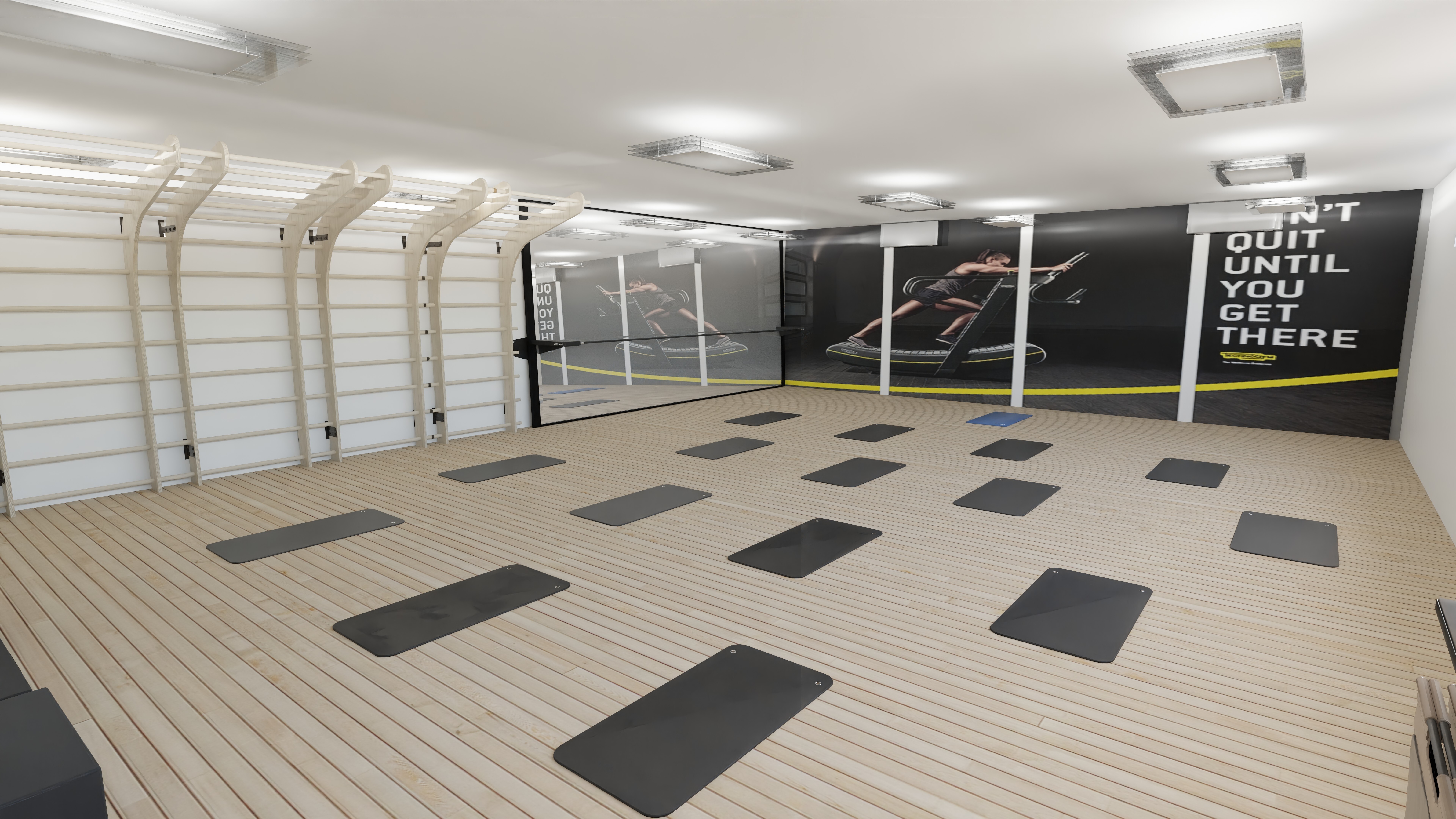 FITSPACE 120m² Bewegungsraum - Ansicht mit Trainingsmatten und Sprossenwand